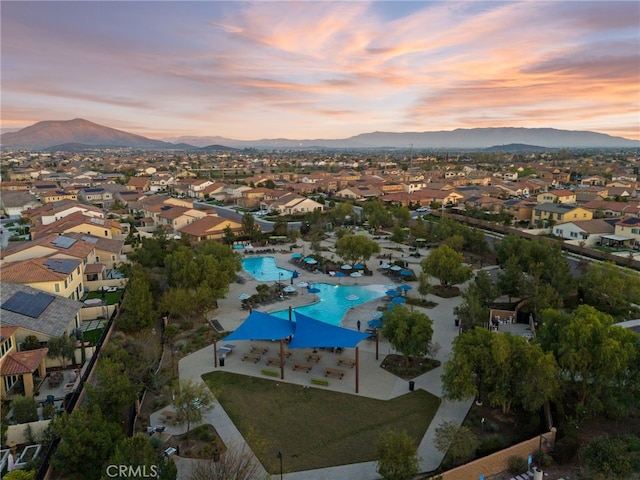 34452 Turquoise Ln, Murrieta, CA 92563 - aerial view at dusk of view of pool area, a mountain view, and a residential view
