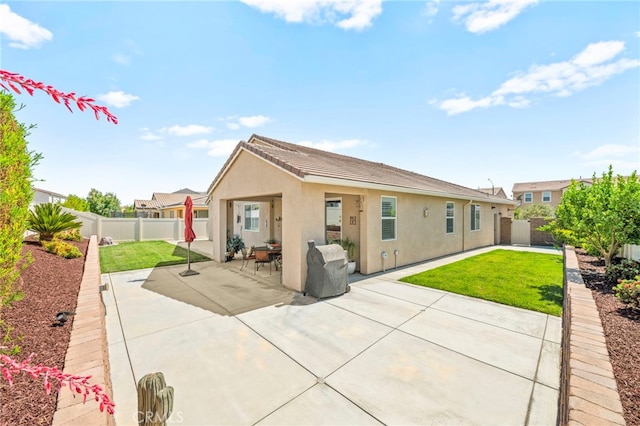 34452 Turquoise Ln, Murrieta, CA 92563 - back of house featuring stucco siding and a patio area