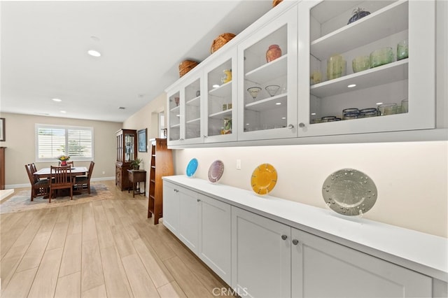 34452 Turquoise Ln, Murrieta, CA 92563 - bar with light wood finished floors, baseboards, and recessed lighting