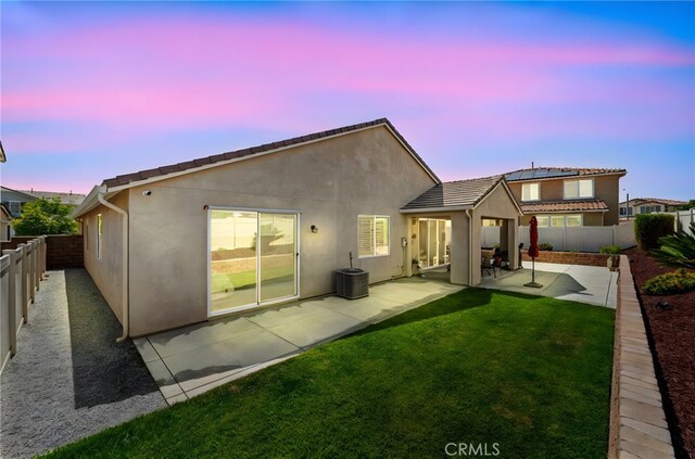 34452 Turquoise Ln, Murrieta, CA 92563 - back of house featuring stucco siding, a patio area, and a tiled roof