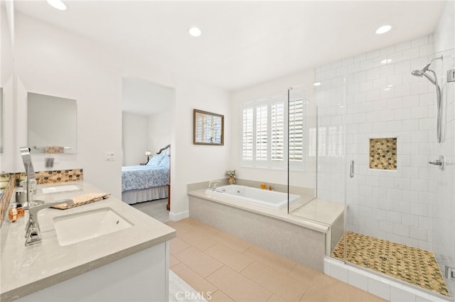34452 Turquoise Ln, Murrieta, CA 92563 - full bathroom with double vanity, a shower stall, a bath, connected bathroom, and recessed lighting
