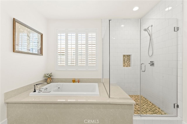 34452 Turquoise Ln, Murrieta, CA 92563 - bathroom featuring a stall shower, a garden tub, and recessed lighting