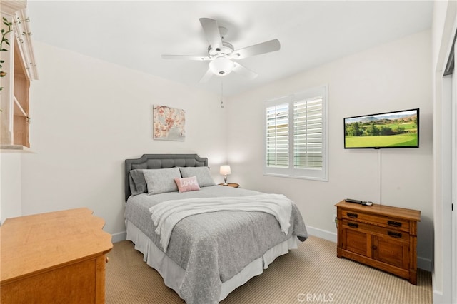 34452 Turquoise Ln, Murrieta, CA 92563 - bedroom with light colored carpet, baseboards, and a ceiling fan