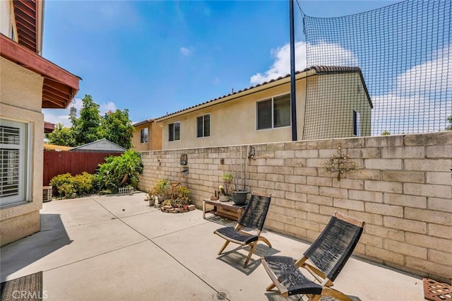 13421 Hubbard St Unit 125, Sylmar, CA 91342 - fenced backyard featuring a patio