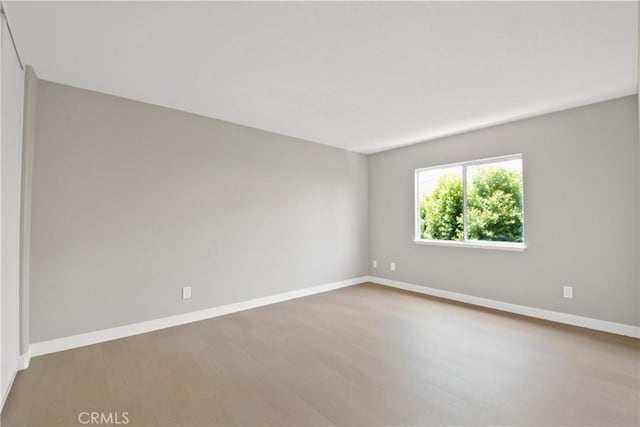9406 Glenaire Ct, Rancho Cucamonga, CA 91730 - empty room featuring wood finished floors and baseboards