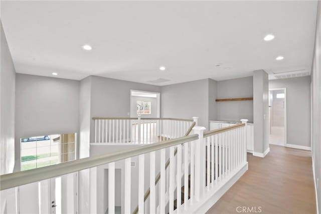 9406 Glenaire Ct, Rancho Cucamonga, CA 91730 - corridor with recessed lighting, wood finished floors, an upstairs landing, and baseboards