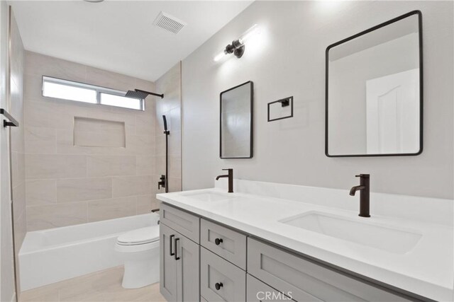 9406 Glenaire Ct, Rancho Cucamonga, CA 91730 - full bath featuring toilet, double vanity, and washtub / shower combination