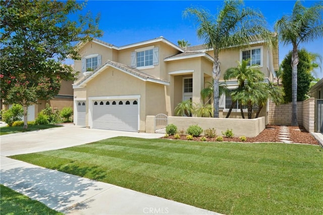9406 Glenaire Ct, Rancho Cucamonga, CA 91730 - view of front of property with stucco siding, concrete driveway, and an attached garage