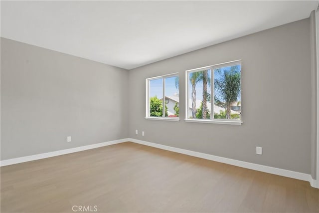 9406 Glenaire Ct, Rancho Cucamonga, CA 91730 - empty room featuring wood finished floors and baseboards