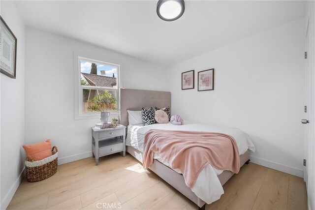 2035 Las Colinas Ave, Los Angeles, CA 90041 - bedroom with light wood finished floors and baseboards