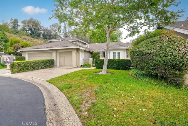 543 Rockport Ct, Encinitas, CA 92024 - ranch-style house with an attached garage, a front lawn, and driveway