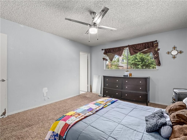 7352 N Adoline Ave, Fresno, CA 93711 - bedroom with carpet flooring, a textured ceiling, a ceiling fan, and baseboards