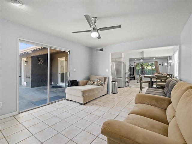 7352 N Adoline Ave, Fresno, CA 93711 - living room featuring light tile patterned floors and ceiling fan