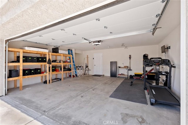 57146 Selecta Ave, Yucca Valley, CA 92284 - garage featuring a garage door opener