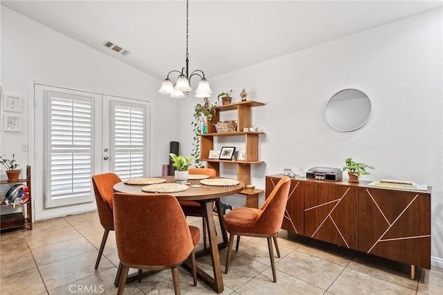 57146 Selecta Ave, Yucca Valley, CA 92284 - dining area with lofted ceiling, a chandelier, light tile patterned floors, and healthy amount of natural light