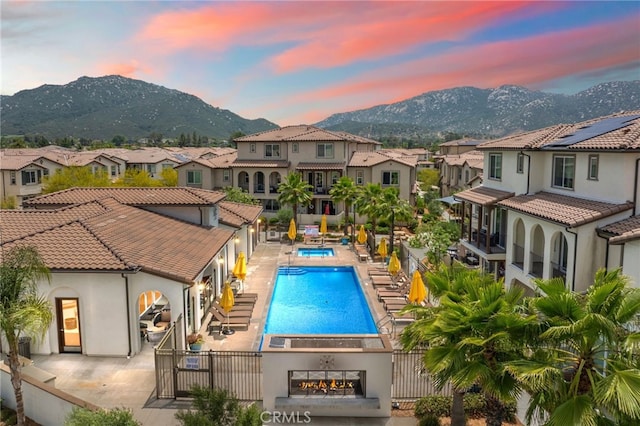 45445 Calle Cirros, Temecula, CA 92592 - community pool featuring a residential view, a mountain view, and a fenced backyard