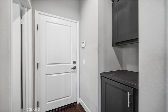 45445 Calle Cirros, Temecula, CA 92592 - doorway to outside with dark wood-type flooring and baseboards