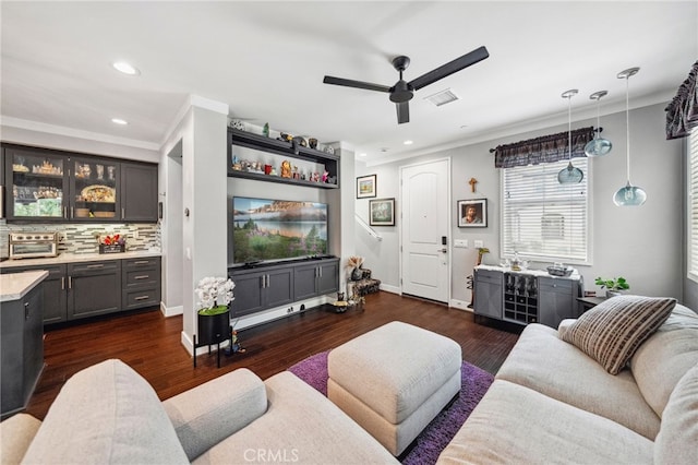 45445 Calle Cirros, Temecula, CA 92592 - living room with a ceiling fan, recessed lighting, crown molding, and dark wood-style flooring