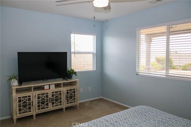 38564 Pallas Ct, Palmdale, CA 93551 - carpeted bedroom with multiple windows, baseboards, and ceiling fan