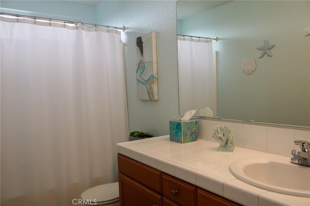 38564 Pallas Ct, Palmdale, CA 93551 - bathroom featuring vanity, toilet, and a shower with shower curtain