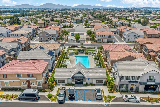 15210 Horizon St Unit 2, Fontana, CA 92336 - aerial view of residential area with a pool area and a mountainous background