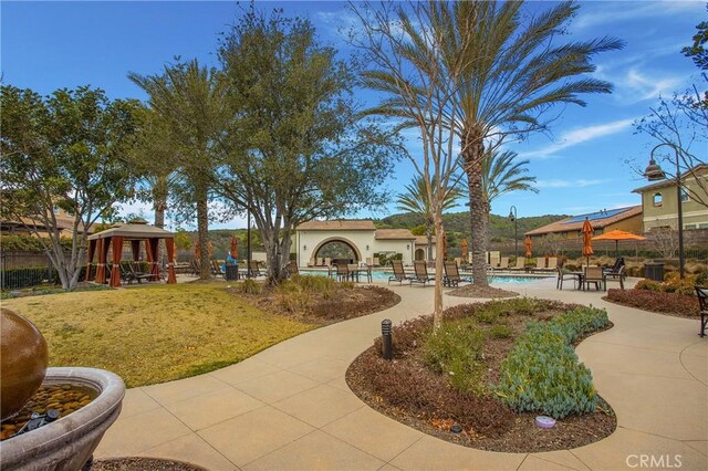 112 Cerrero Ct, Rancho Mission Viejo, CA 92694 - surrounding community with a gazebo, a pool, and a patio area