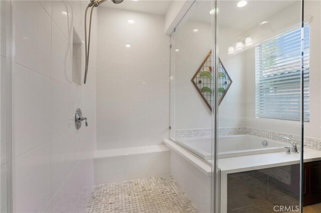 112 Cerrero Ct, Rancho Mission Viejo, CA 92694 - bathroom featuring tiled shower and a garden tub