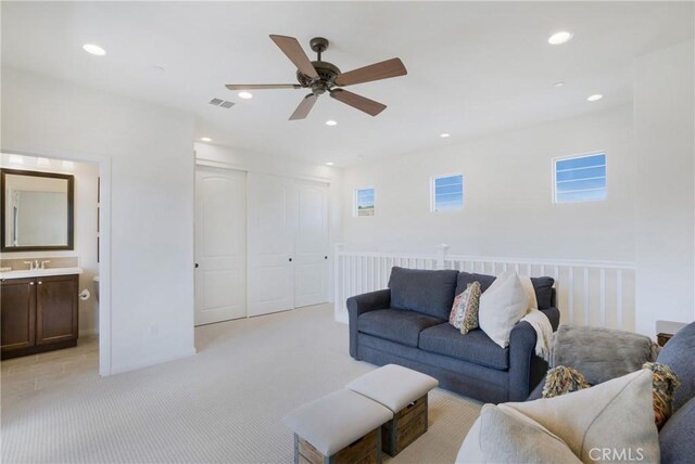 112 Cerrero Ct, Rancho Mission Viejo, CA 92694 - living room featuring ceiling fan, recessed lighting, and light carpet