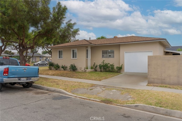 6532 Bonnie Vale Ave, Pico Rivera, CA 90660 - ranch-style house featuring stucco siding, a garage, and driveway
