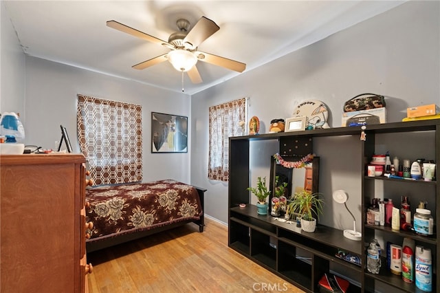 6532 Bonnie Vale Ave, Pico Rivera, CA 90660 - bedroom featuring wood finished floors and a ceiling fan