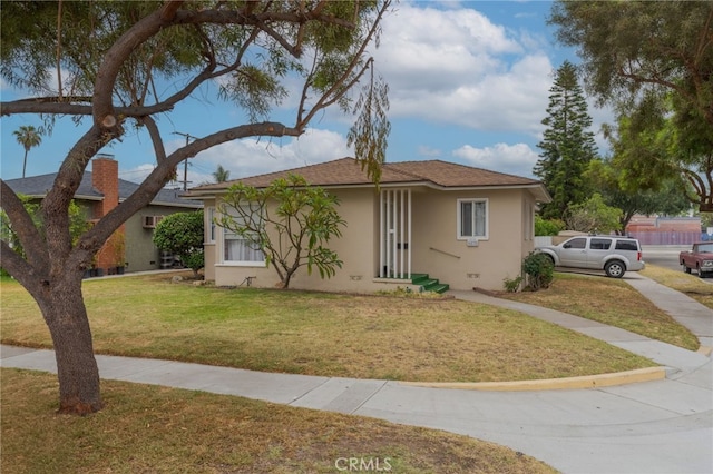 6532 Bonnie Vale Ave, Pico Rivera, CA 90660 - view of front of home with stucco siding and a front yard