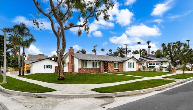 1905 Davis St, Corona, CA 92882 - single story home featuring a front yard, brick siding, and a chimney