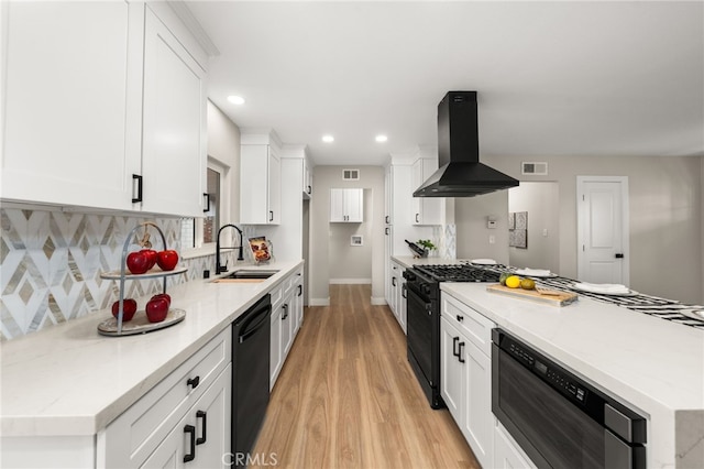 1905 Davis St, Corona, CA 92882 - kitchen featuring range hood, a sink, gas range oven, black dishwasher, and light wood-style flooring