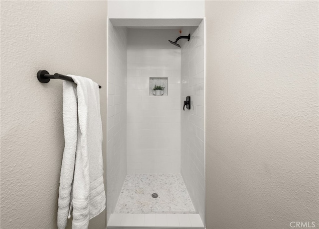1905 Davis St, Corona, CA 92882 - full bath with a tile shower and a textured wall
