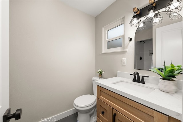 1905 Davis St, Corona, CA 92882 - bathroom featuring toilet, vanity, and baseboards