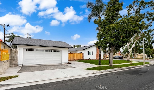 1905 Davis St, Corona, CA 92882 - view of front facade featuring a garage, stucco siding, and concrete driveway
