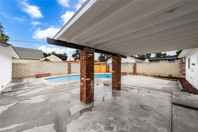 1905 Davis St, Corona, CA 92882 - view of pool featuring a fenced backyard and a patio