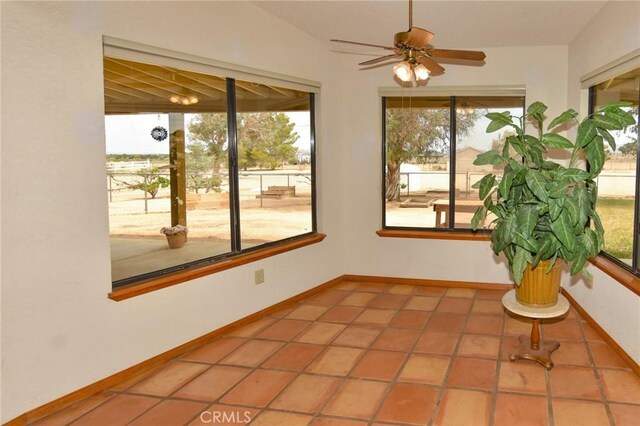 22478 Poppy Rd, Apple Valley, CA 92308 - unfurnished sunroom featuring healthy amount of natural light and tile patterned floors