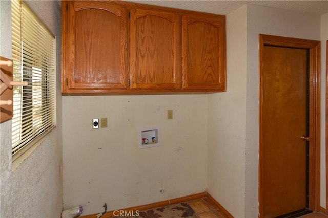 22478 Poppy Rd, Apple Valley, CA 92308 - washroom with hookup for a washing machine, cabinet space, electric dryer hookup, and baseboards
