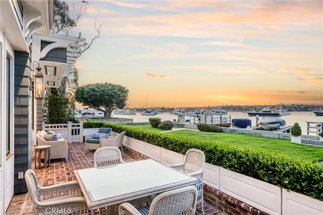 505 W Edgewater Ave, Newport Beach, CA 92661 - view of patio featuring an outdoor hangout area and a water view