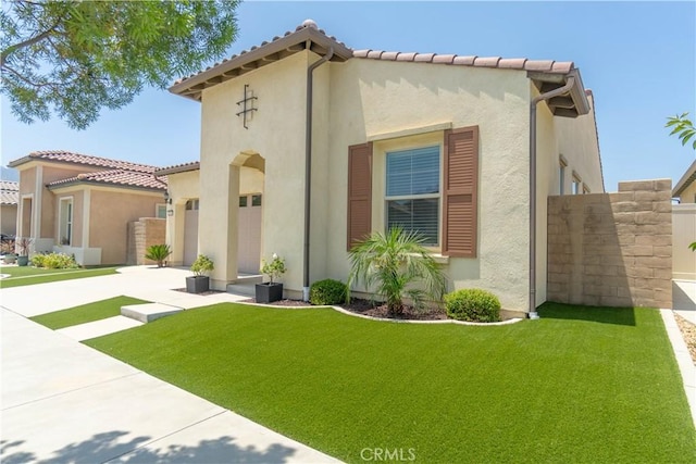 24385 Overlook Dr, Corona, CA 92883 - mediterranean / spanish-style home featuring stucco siding, a garage, a tile roof, and driveway