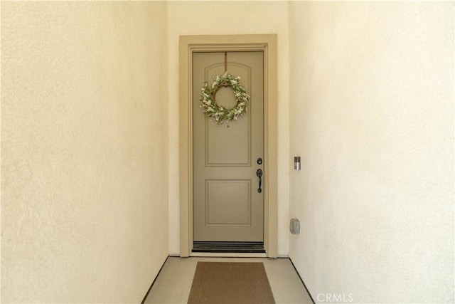 24385 Overlook Dr, Corona, CA 92883 - view of exterior entry with stucco siding