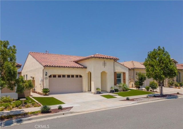 24385 Overlook Dr, Corona, CA 92883 - mediterranean / spanish-style home featuring stucco siding, an attached garage, and a tile roof