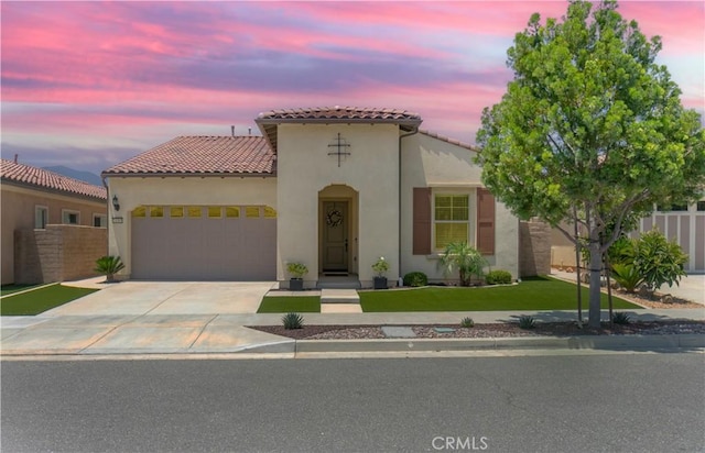 24385 Overlook Dr, Corona, CA 92883 - mediterranean / spanish house featuring an attached garage, stucco siding, driveway, and a tiled roof