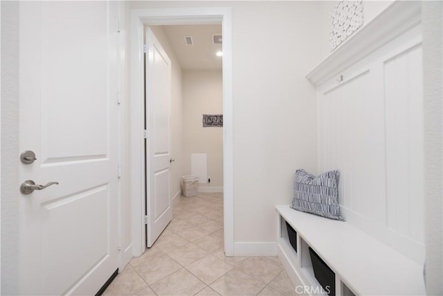 24385 Overlook Dr, Corona, CA 92883 - mudroom with light tile patterned floors and baseboards