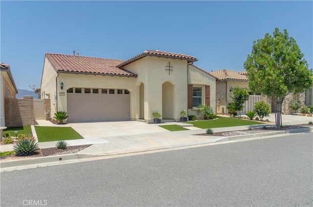 24385 Overlook Dr, Corona, CA 92883 - mediterranean / spanish-style home featuring a tiled roof, a garage, stucco siding, and driveway