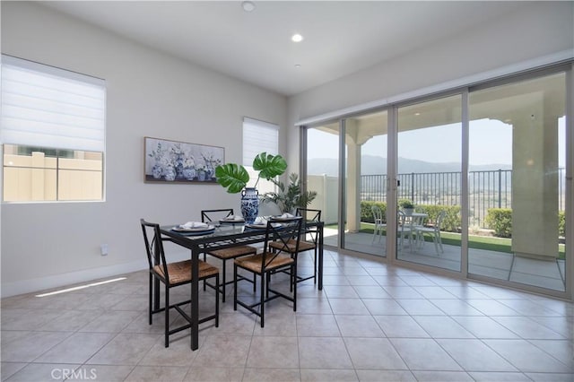 24385 Overlook Dr, Corona, CA 92883 - dining space with light tile patterned floors, recessed lighting, and a mountain view