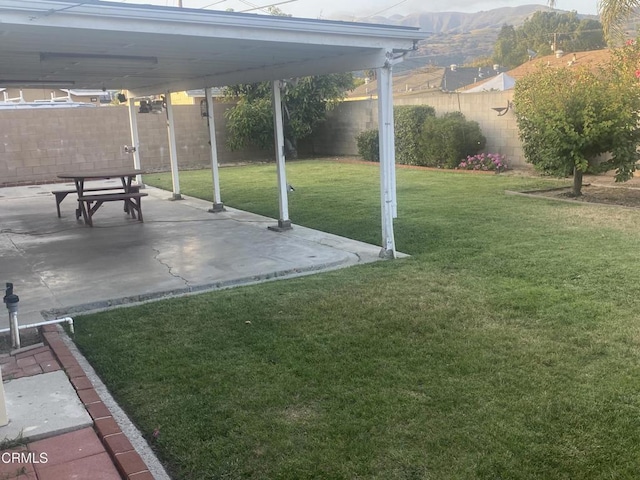 312 Rhodes Ct, Fillmore, CA 93015 - fenced backyard featuring a patio