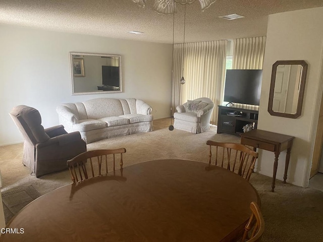312 Rhodes Ct, Fillmore, CA 93015 - carpeted living area featuring a textured ceiling