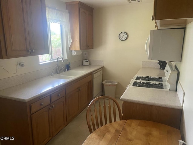 312 Rhodes Ct, Fillmore, CA 93015 - kitchen with white appliances and light countertops